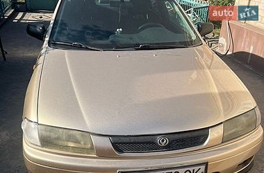 Седан Mazda 323 1997 в Днепре