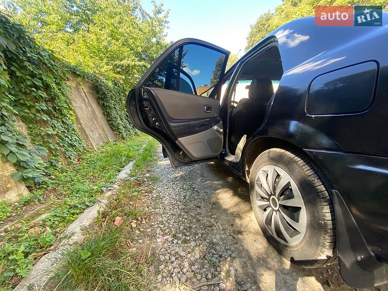 Седан Mazda 323 2003 в Кам'янець-Подільському фото 14 Седан Mazda 323 2003 в Кам'янець-Подільському