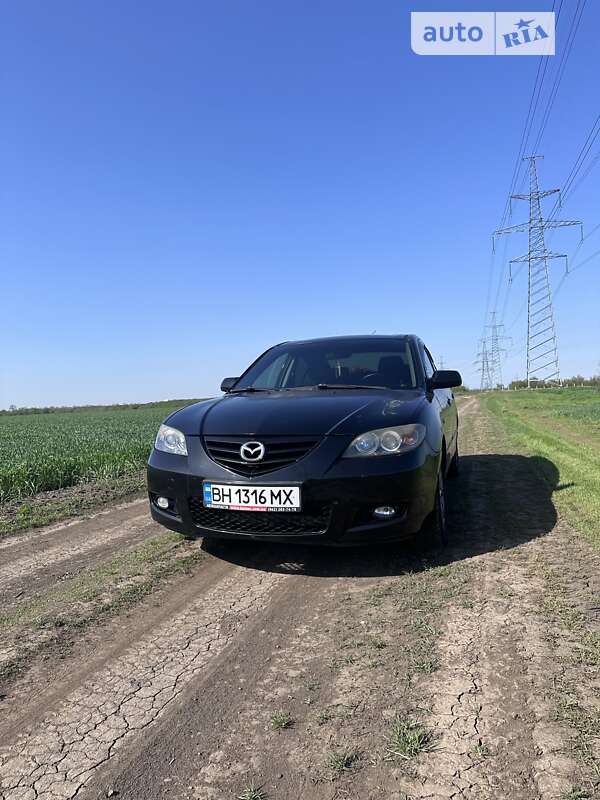 Mazda 3, I поколение