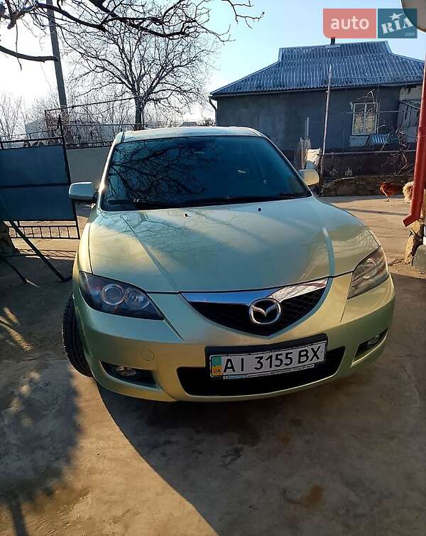 2008 Mazda 3, VIN JMZBK12Z201760328:plate — photo 1 (autoria)