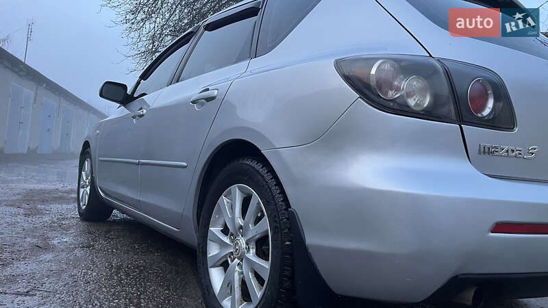 2006 Mazda 3, VIN JMZBK14Z571502636:plate — фото 1 (autoria)