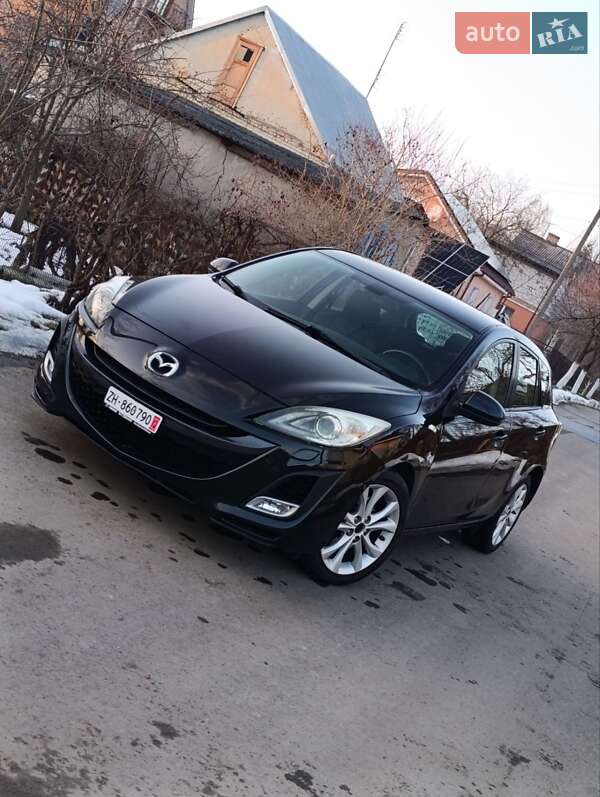 2009 Mazda 3, VIN JMZBLA4F701104771:plate — zdjęcie 1 (autoria)
