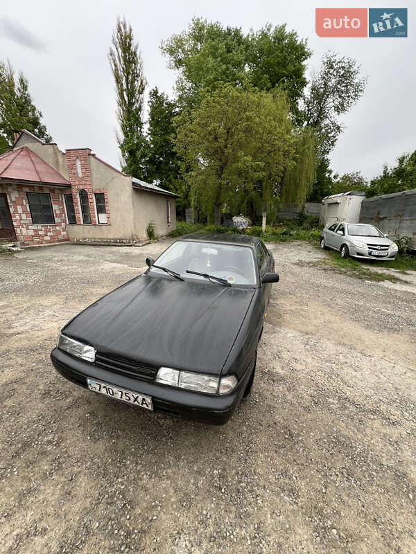 Купе Mazda 626 1989 в 