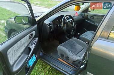 Хэтчбек Mazda 626 1999 в 