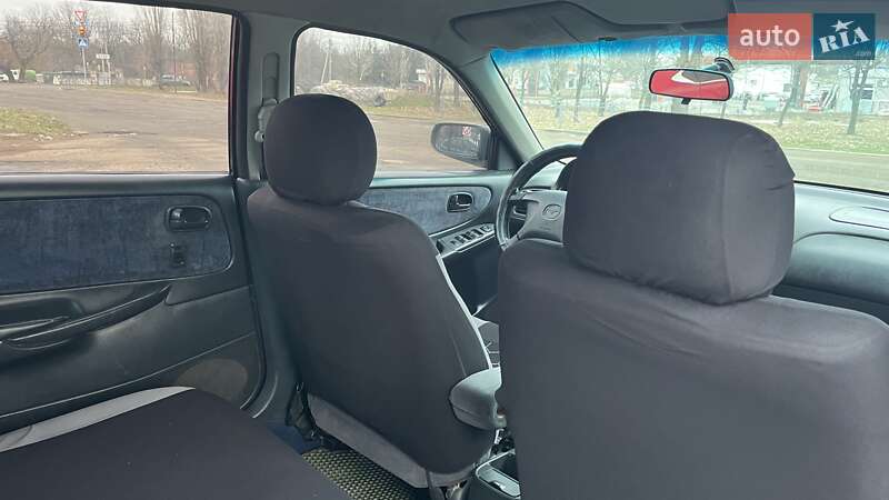 Хэтчбек Mazda 626 1998 в Николаеве фото 10 Хэтчбек Mazda 626 1998 в Николаеве