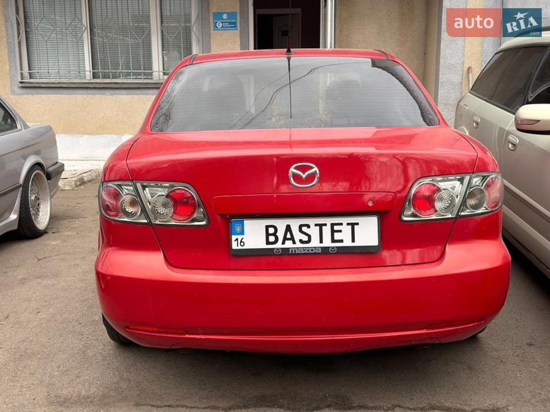 2007 Mazda 6, VIN JMZGG12F771689998:plate — фото 1 (autoria)