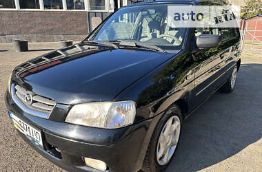 Хэтчбек Mazda Demio 2002 в 