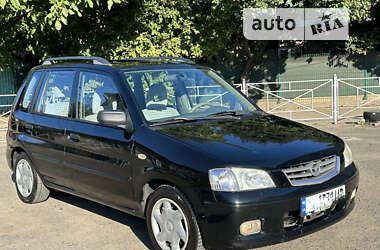 Хэтчбек Mazda Demio 2002 в 