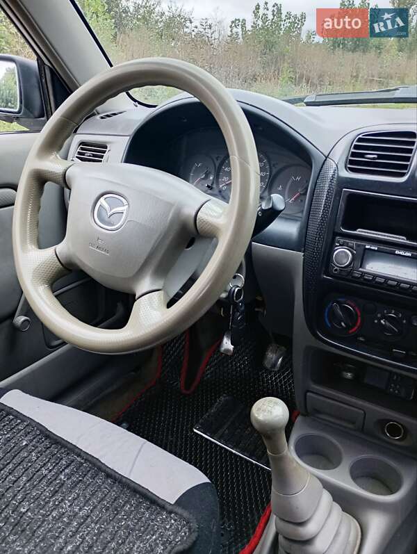 Хэтчбек Mazda Demio 2000 в Каменец-Подольском