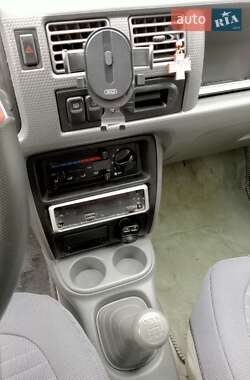 Хэтчбек Mazda Demio 1999 в 