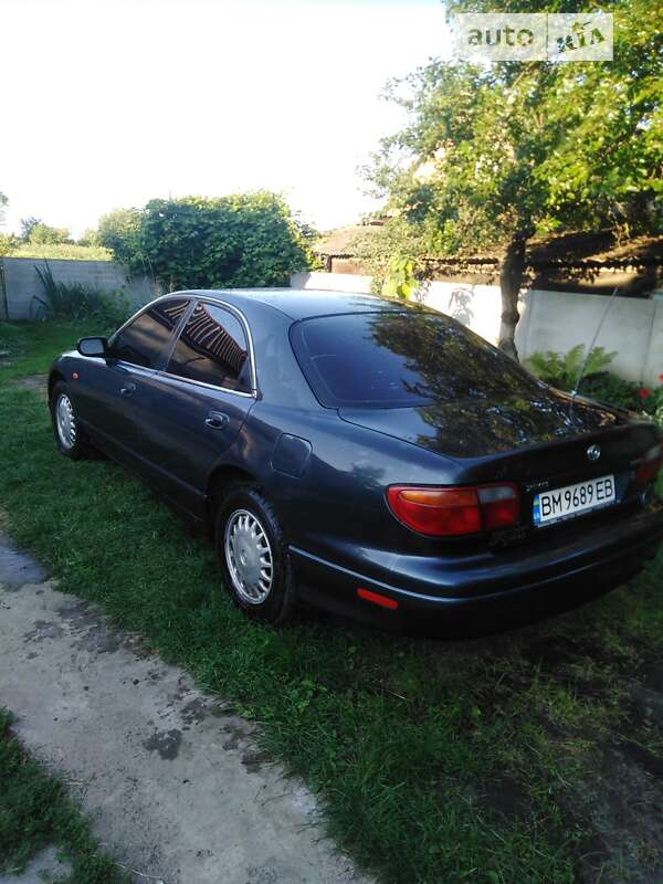 Седан Mazda Xedos 9 1994 в Ромнах