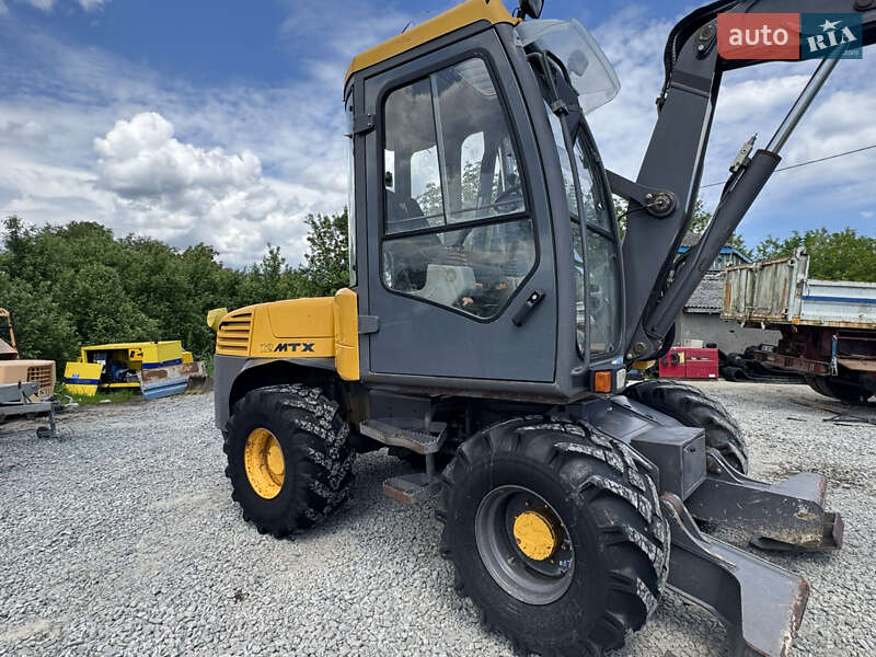 Колісний екскаватор Mecalac 12MXT 2010 в Недобоївцях