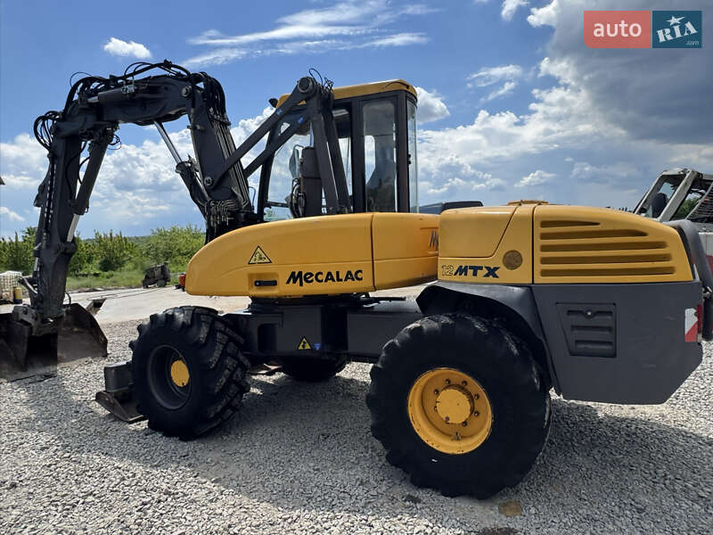 Колісний екскаватор Mecalac 12MXT 2010 в Недобоївцях