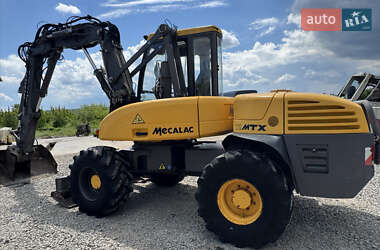 Колесный экскаватор Mecalac 12MXT 2010 в 