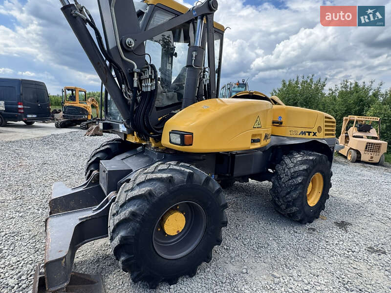 Колісний екскаватор Mecalac 12MXT 2010 в Недобоївцях