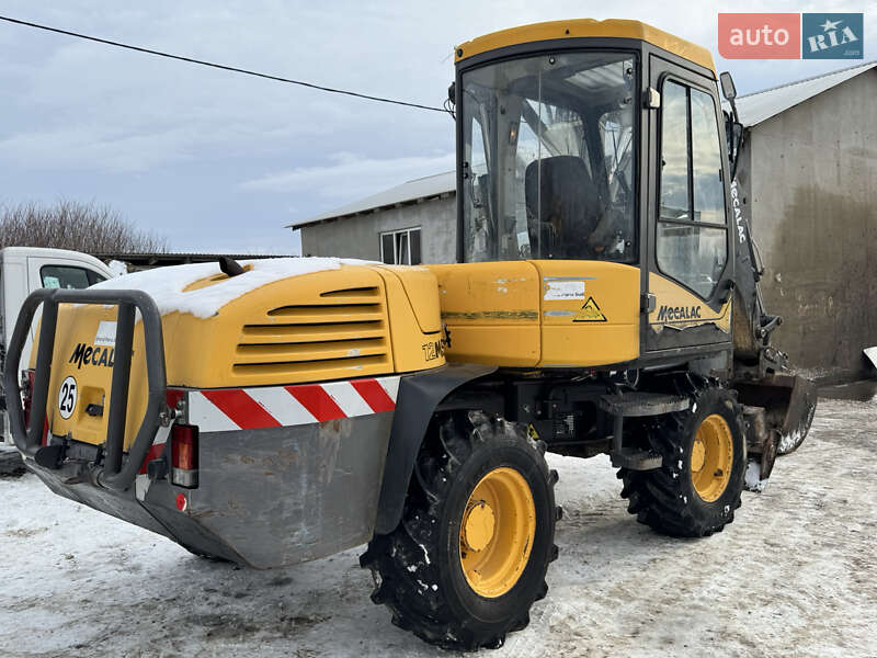Колесный экскаватор Mecalac 12MXT 2006 в Недобоевцах