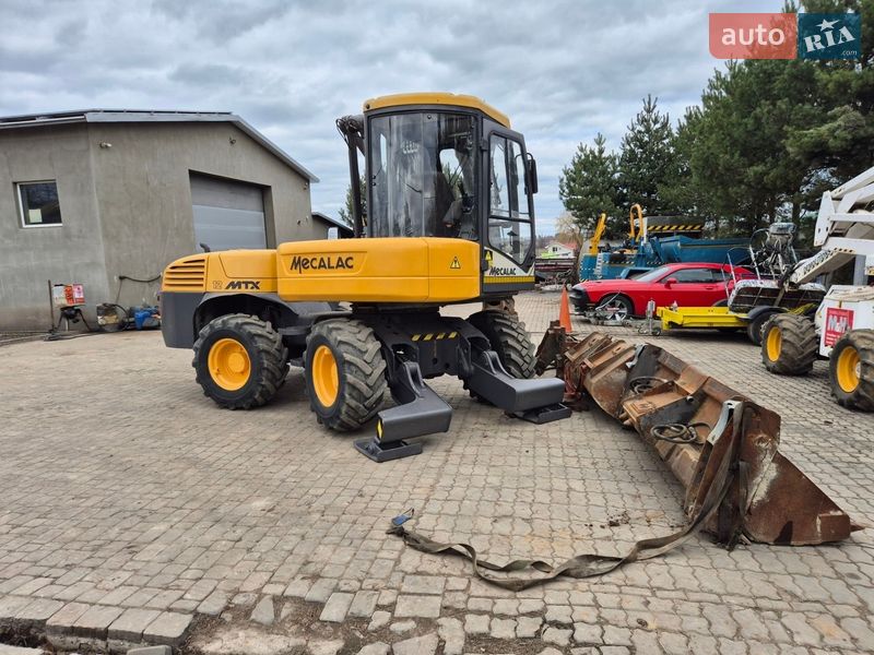 Колесный экскаватор Mecalac 12MXT 2011 в Бучаче
