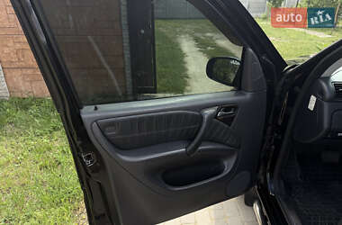 Внедорожник / Кроссовер Mercedes-Benz M-Class 2004 в 