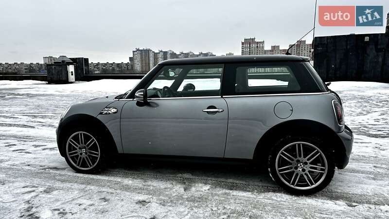 2010 Mini Cooper, VIN WMWMG31040TV99607:plate — фото 1 (autoria)