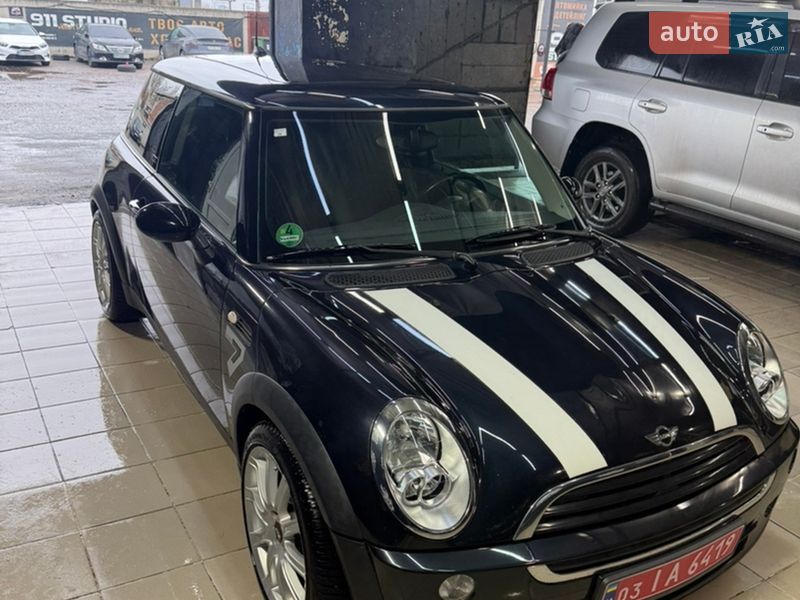 2007 Mini Cooper, VIN WMWRA31030TE25067:plate — фото 1 (autoria)