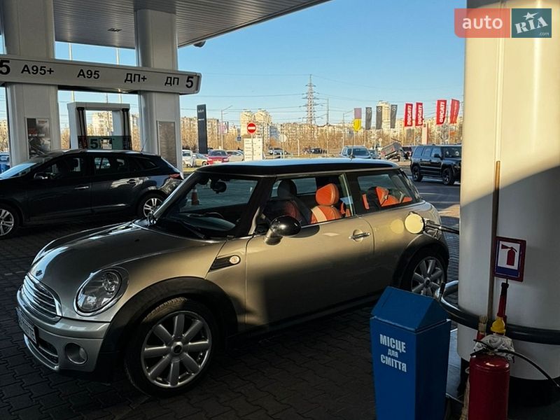 2008 Mini Cooper, VIN WMWMG31060TL29228:plate — фото 1 (autoria)