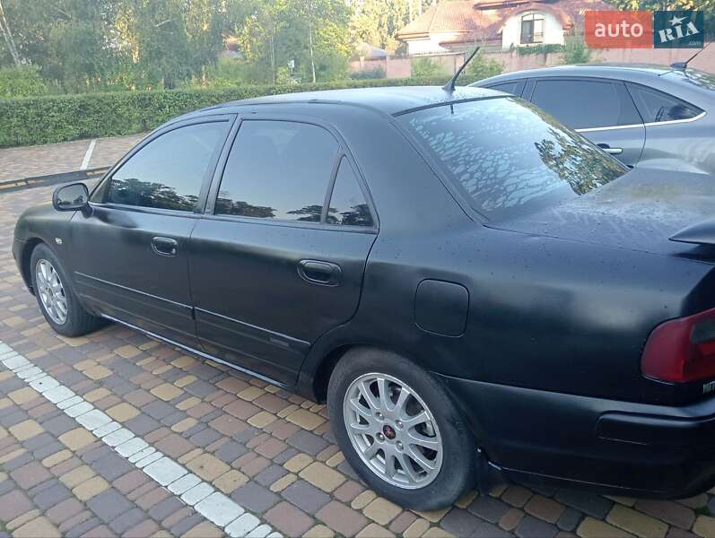 Седан Mitsubishi Carisma 2003 в Буче