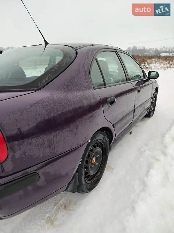 Mitsubishi Carisma 2002 VIN XMCLNDA1A2F004900 фото оголошення 6 з 42