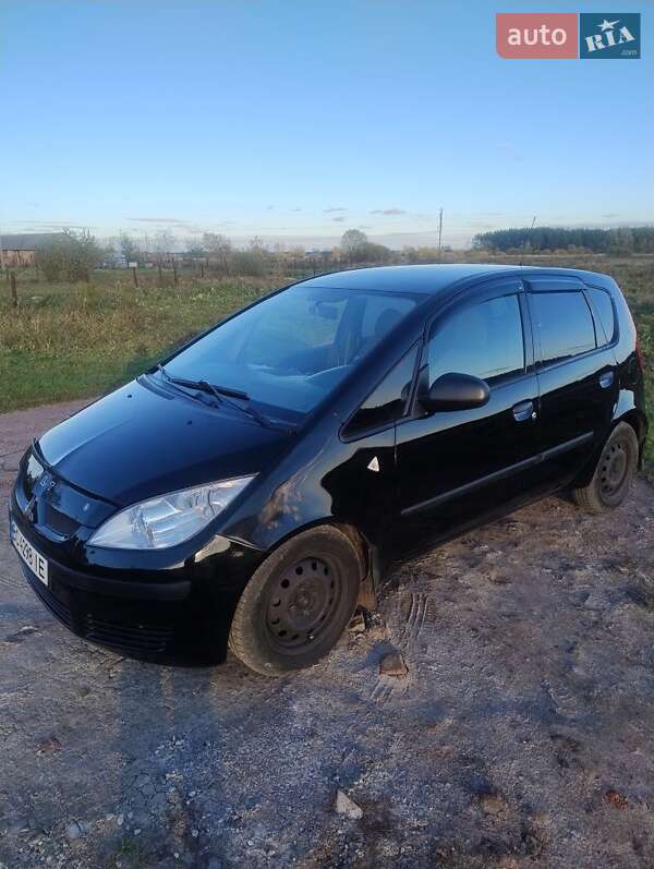 Хетчбек Mitsubishi Colt 2006 в  фото Хетчбек Mitsubishi Colt 2006 в