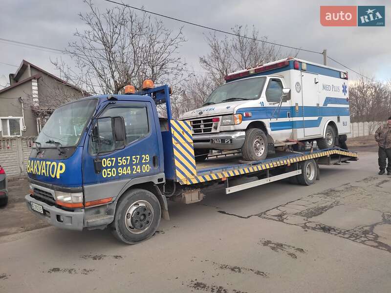 Эвакуатор Mitsubishi Fuso Canter 1999 в Новомосковске