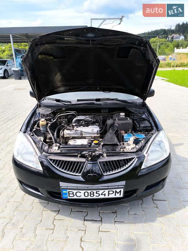 Седан Mitsubishi Lancer 2004 в Сходнице фото 8 Седан Mitsubishi Lancer 2004 в Сходнице