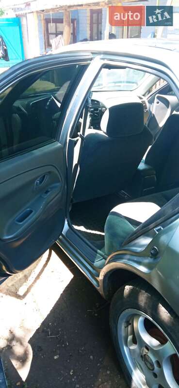 Седан Mitsubishi Lancer 1998 в Ширяево