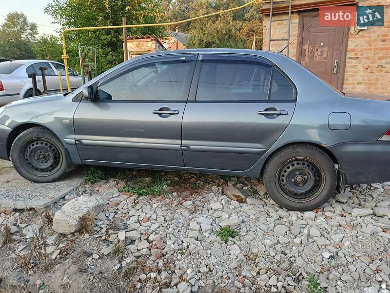 Седан Mitsubishi Lancer 2008 в Ромнах