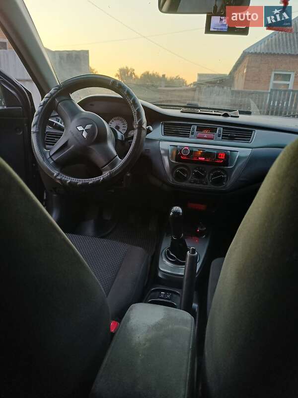 Седан Mitsubishi Lancer 2008 в Ромнах