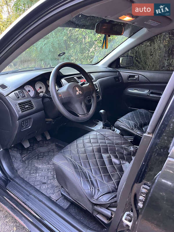 Седан Mitsubishi Lancer 2009 в Верховец