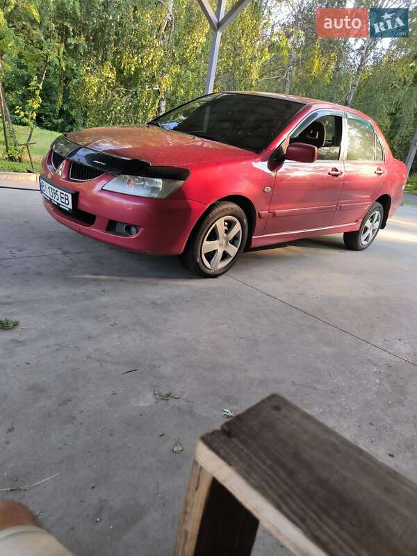 Седан Mitsubishi Lancer 2004 в Каменском фото 7 Седан Mitsubishi Lancer 2004 в Каменском
