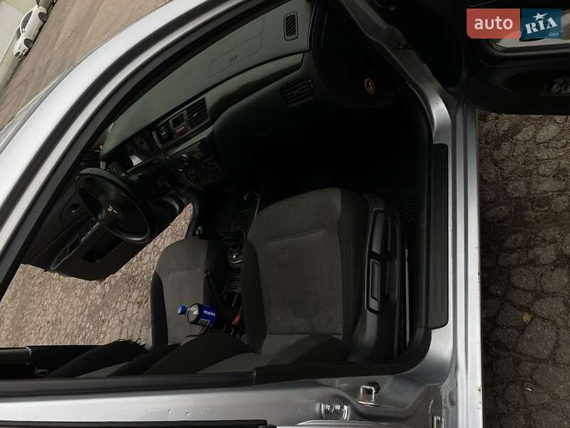 Седан Mitsubishi Lancer 2007 в Каменском фото 8 Седан Mitsubishi Lancer 2007 в Каменском