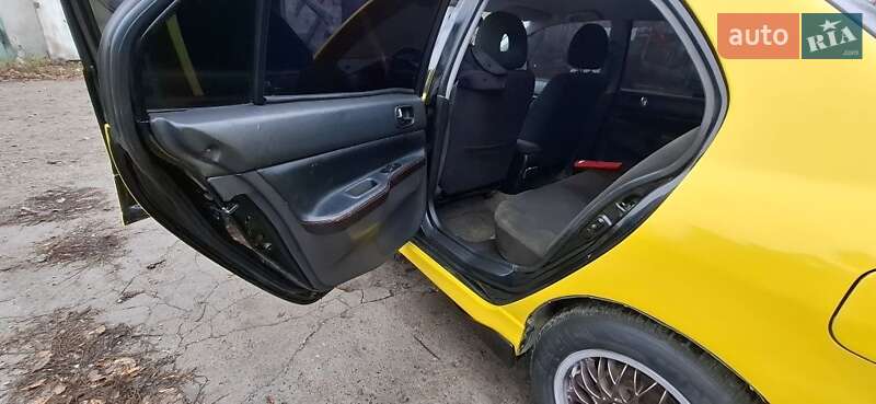 Седан Mitsubishi Lancer 2004 в Кам'янському фото 8 Седан Mitsubishi Lancer 2004 в Кам'янському