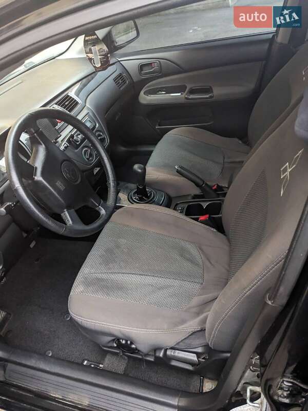 Седан Mitsubishi Lancer 2004 в Новгородці фото 15 Седан Mitsubishi Lancer 2004 в Новгородці