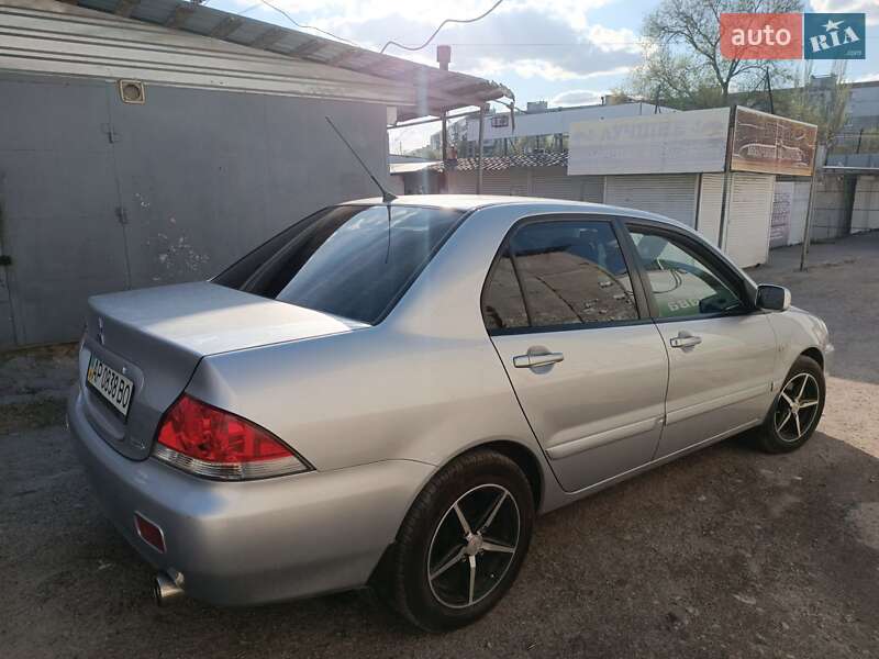 2009 Mitsubishi Lancer, VIN JMBSNCS3A9U000747:plate — фото 1 (autoria)