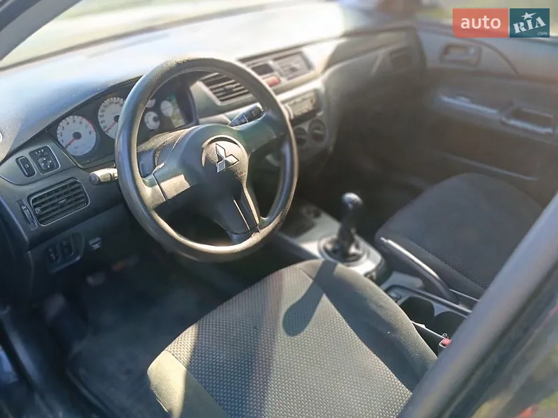 Mitsubishi Lancer 2008 VIN JMBSNCS3A8U004735 фото оголошення 8 з 37