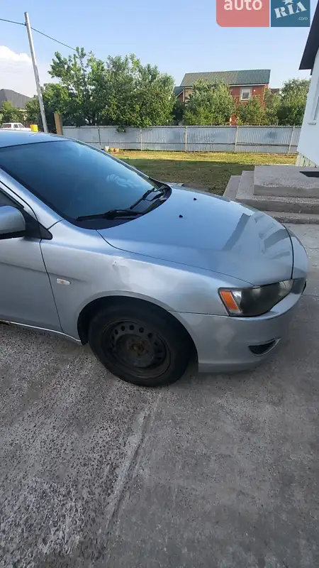 Mitsubishi Lancer 2009 VIN JMBSRCY2A9U004806 фото оголошення 4 з 46