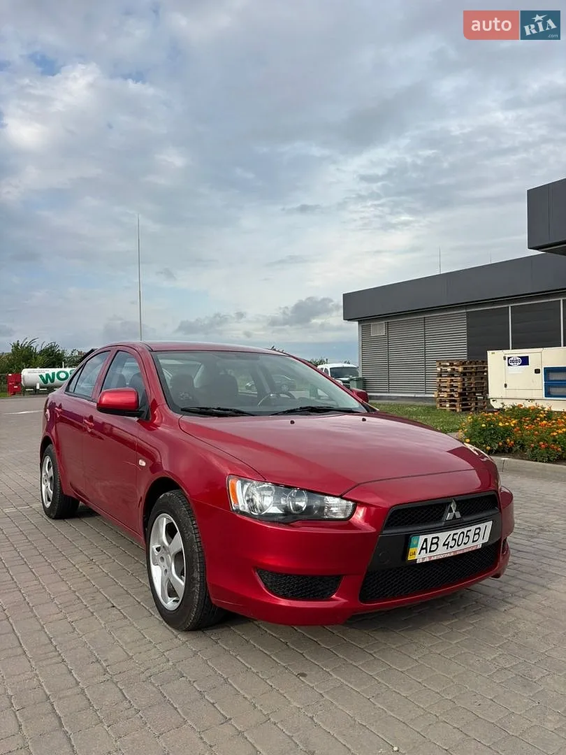 2011 Mitsubishi Lancer - фото 1