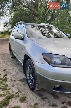 Внедорожник / Кроссовер Mitsubishi Outlander 2003 в 