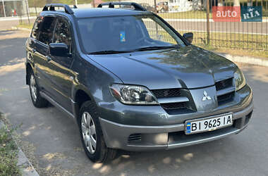 Внедорожник / Кроссовер Mitsubishi Outlander 2003 в 