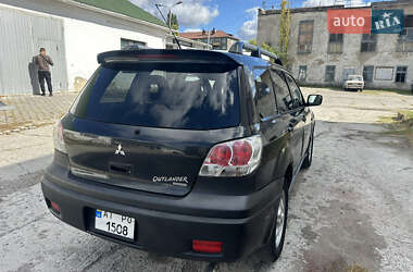 Внедорожник / Кроссовер Mitsubishi Outlander 2004 в 