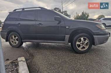 Внедорожник / Кроссовер Mitsubishi Outlander 2004 в 