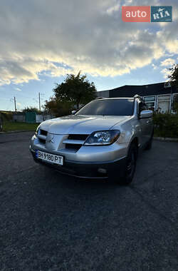 Внедорожник / Кроссовер Mitsubishi Outlander 2004 в  фото 2 Внедорожник / Кроссовер Mitsubishi Outlander 2004 в