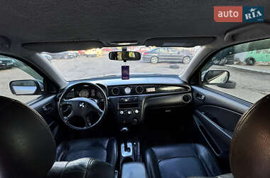 Внедорожник / Кроссовер Mitsubishi Outlander 2004 в  фото 23 Внедорожник / Кроссовер Mitsubishi Outlander 2004 в