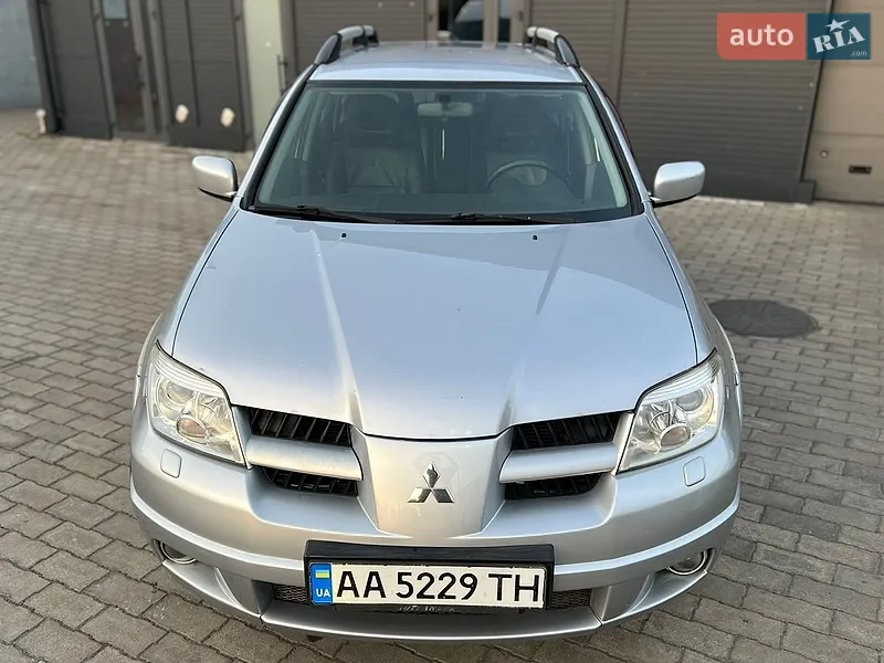 Mitsubishi Outlander 2006 VIN JMBXRCU5W7U000678 фото оголошення 4 з 153