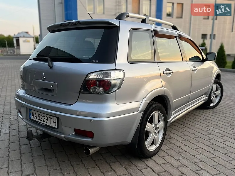 Mitsubishi Outlander 2006 VIN JMBXRCU5W7U000678 фото оголошення 8 з 153
